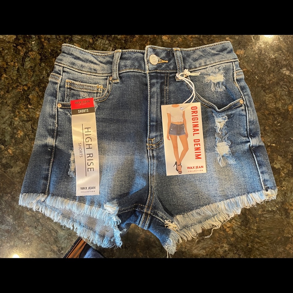 NWT Lightly distressed, high waist denim shorts.  Brand name: Wax Jean